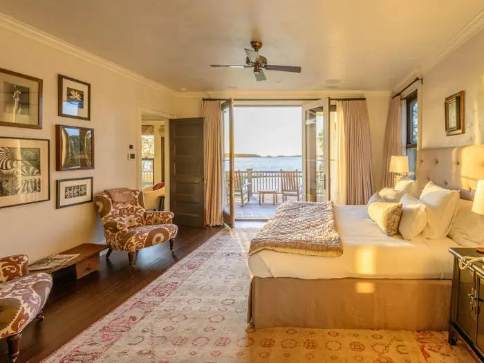 Here’s a look at one of the guest bedrooms with views of the ocean.