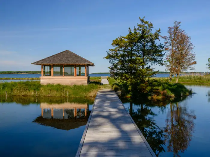 The property has its own private dock (with covered porch).