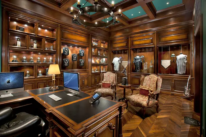 the-east-wing-features-a-his-personal-office-with-more-wood-paneled-walls-and-baseball-memorabilia