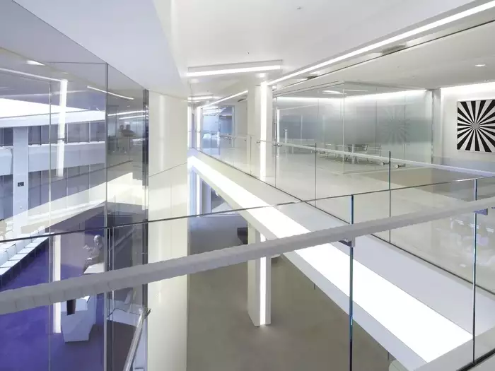 The London offices for international law firm K&L Gates make use of an unusually shaped building to create high-tech and collaborative work spaces