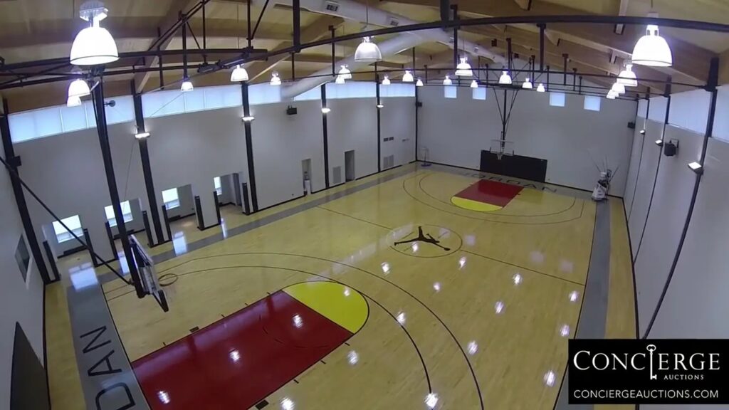 The full-court basketball court is the centerpiece of  the house.