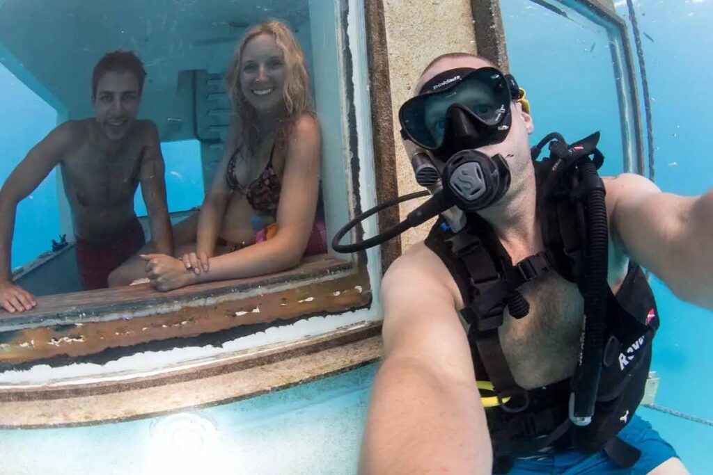 The ultimate selfie: Anhede and the underwater room,  plus some models for The Manta Resort.