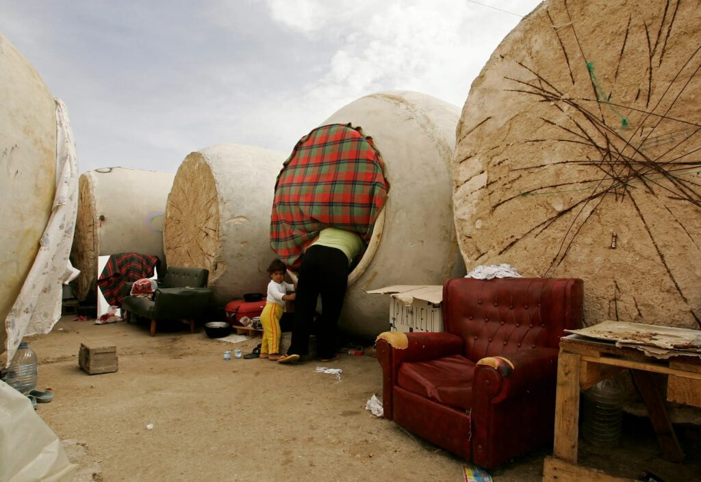 this-bulgarian-woman-lives-in-a-car-sized-wine-vat-in-central-spain-there-are-about-40-people-living-in-this-makeshift-camp-who-came-to-pick-grapes-during-the-six-week-annual-harvest